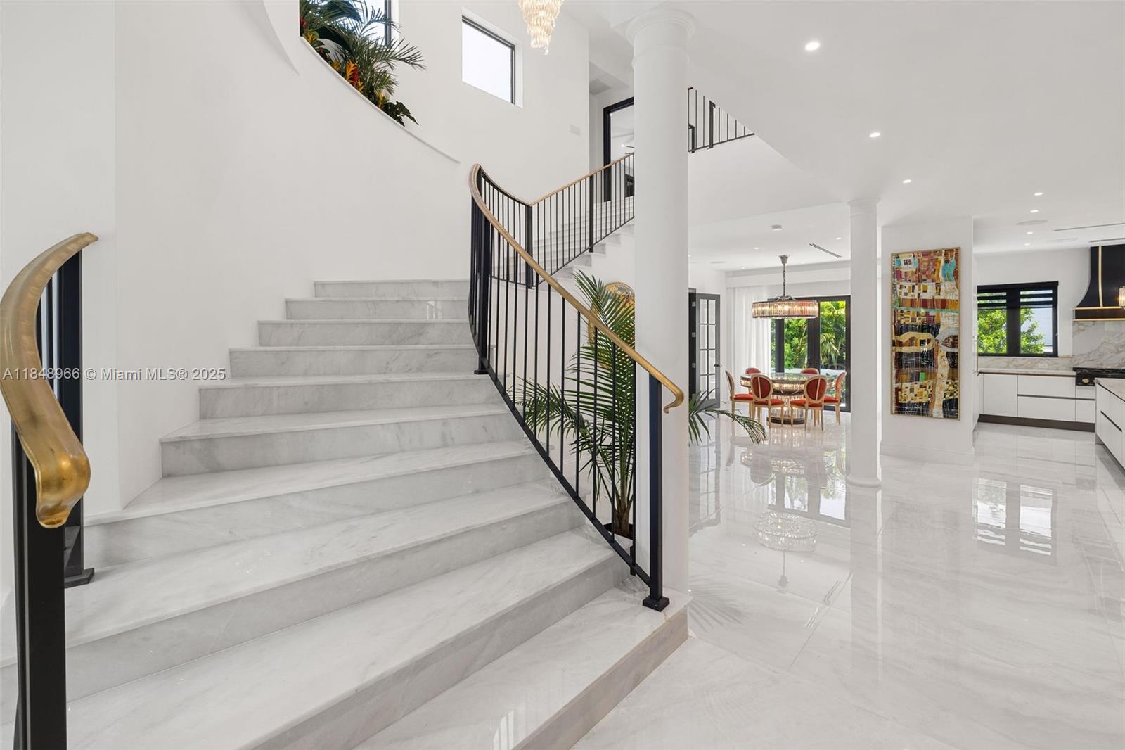 2321 North Bay Road Miami Beach, FL 33140 - Photo 39 of 77 a view of entryway and hall with wooden floor