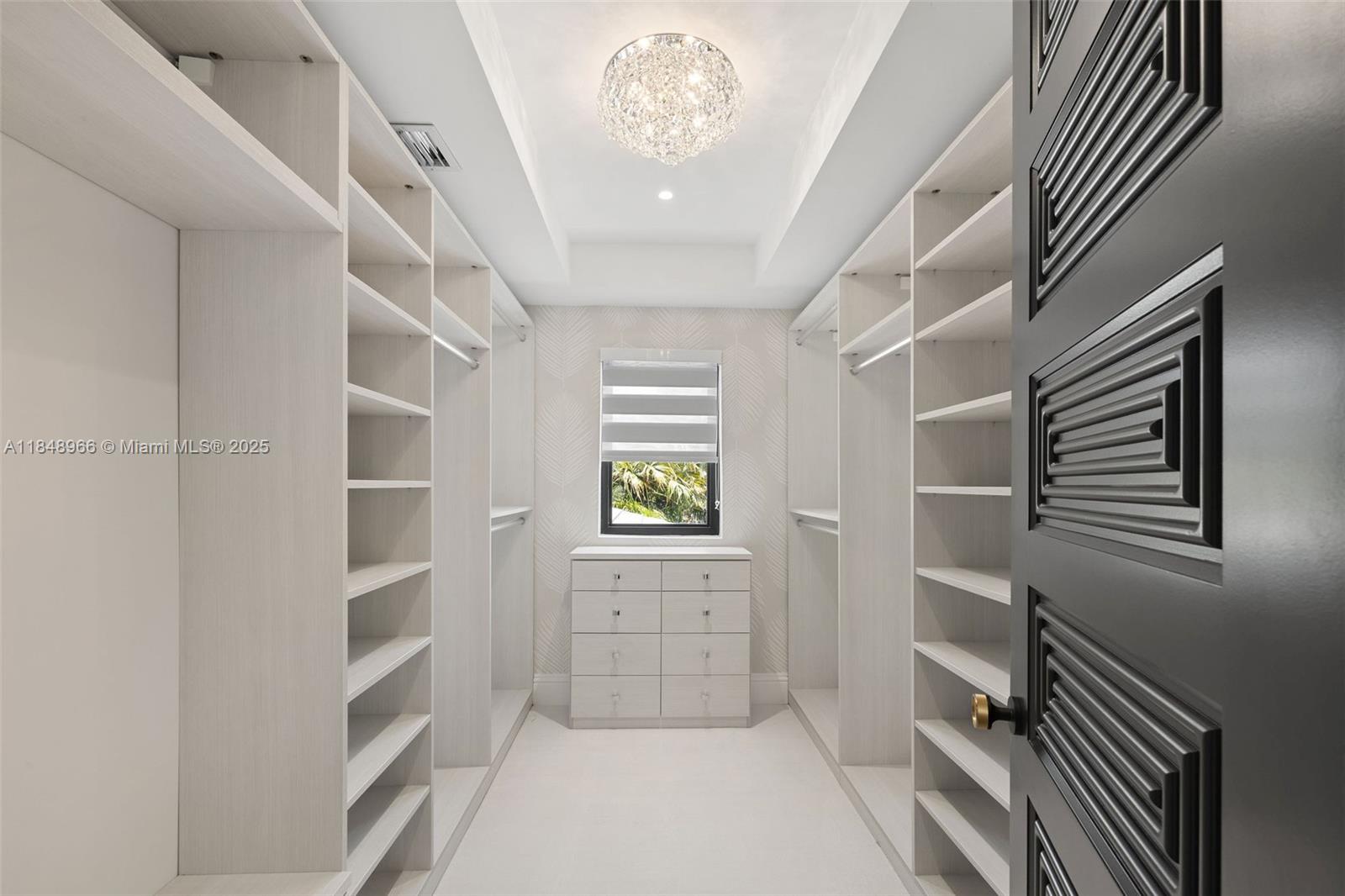 2321 North Bay Road Miami Beach, FL 33140 - Photo 51 of 77 a view of entryway with stairs and wooden floor