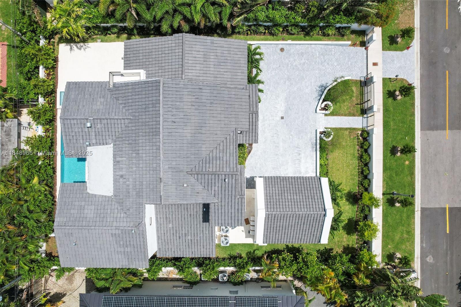2321 North Bay Road Miami Beach, FL 33140 - Photo 67 of 77 an aerial view of a house with outdoor space and pool view