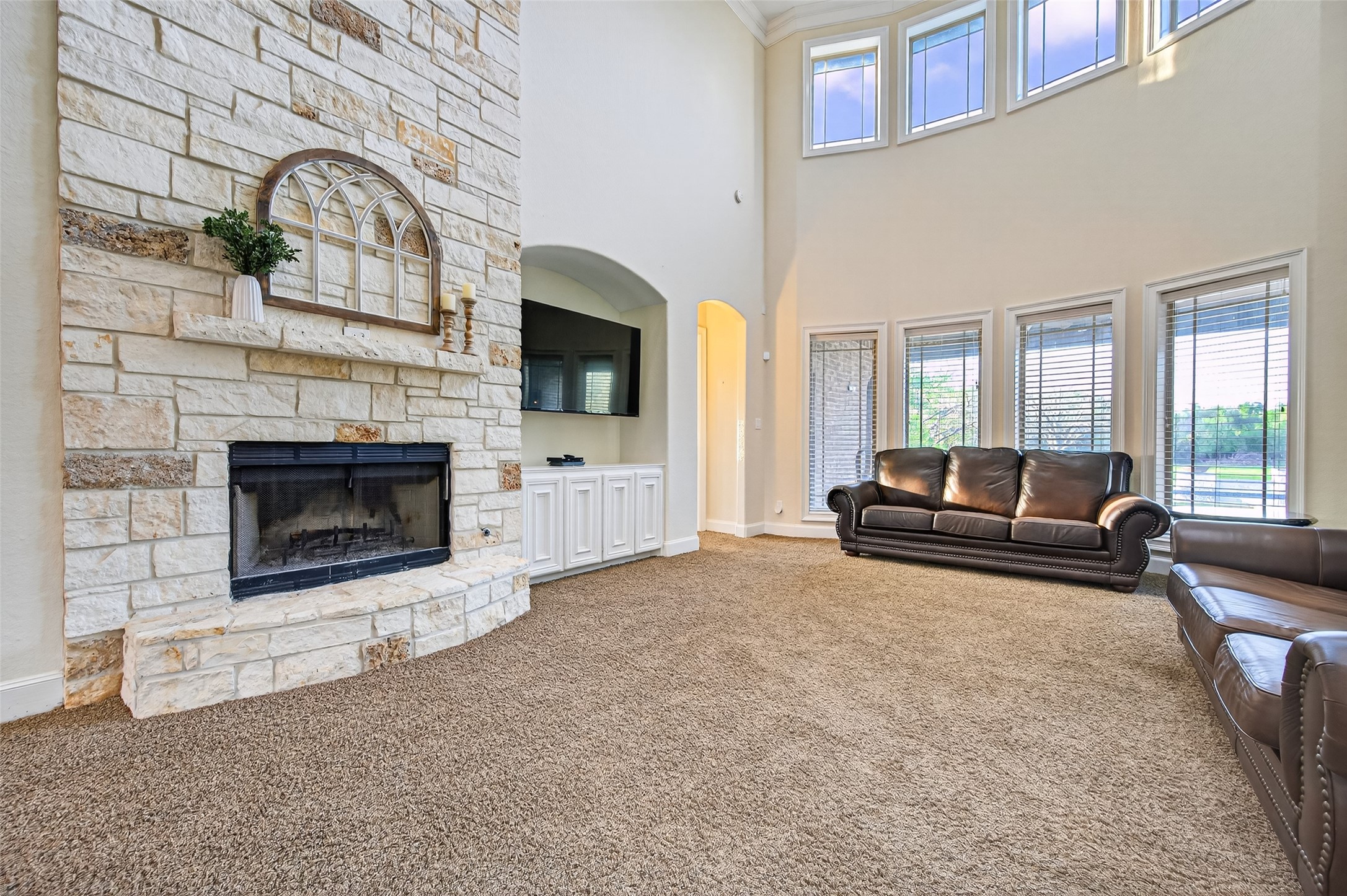 633 Crenshaw Road Houston, TX 77504 - Photo 14 of 50 a living room with furniture and a fireplace