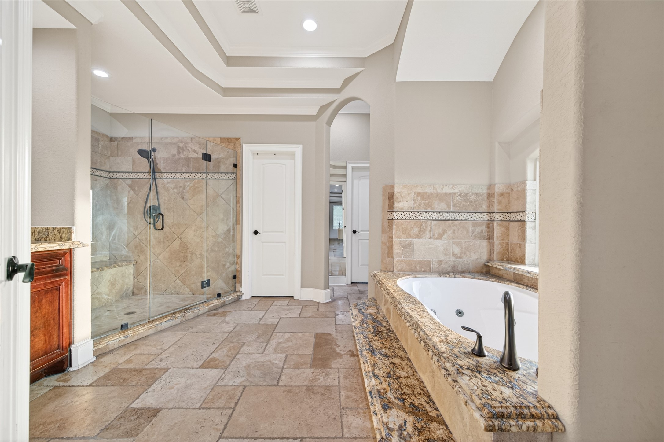 633 Crenshaw Road Houston, TX 77504 - Photo 30 of 50 a bathroom with a tub shower and window