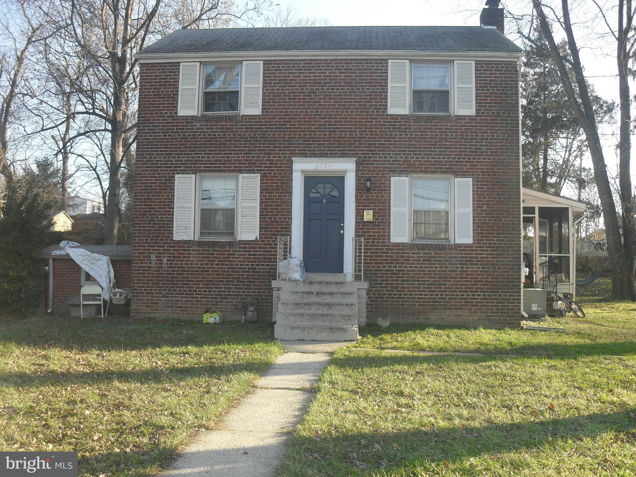 2014 Evans Parkway Silver Spring, MD 20902 - Photo 2 of 8 a front view of a house with a yard