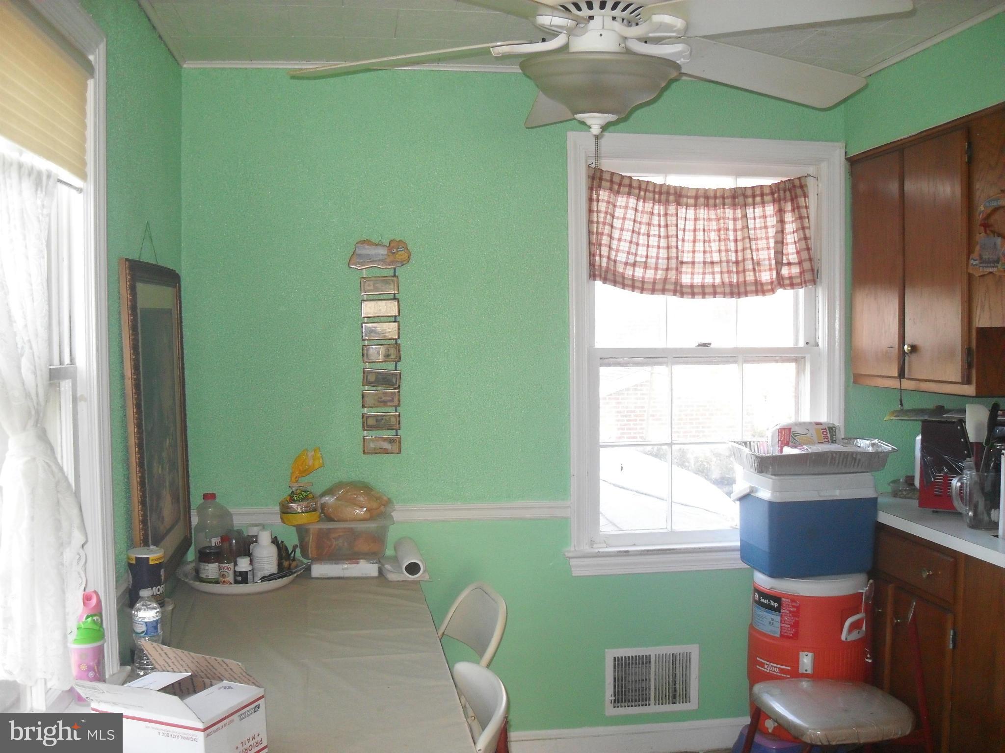 2014 Evans Parkway Silver Spring, MD 20902 - Photo 3 of 8 a living room with furniture and a window