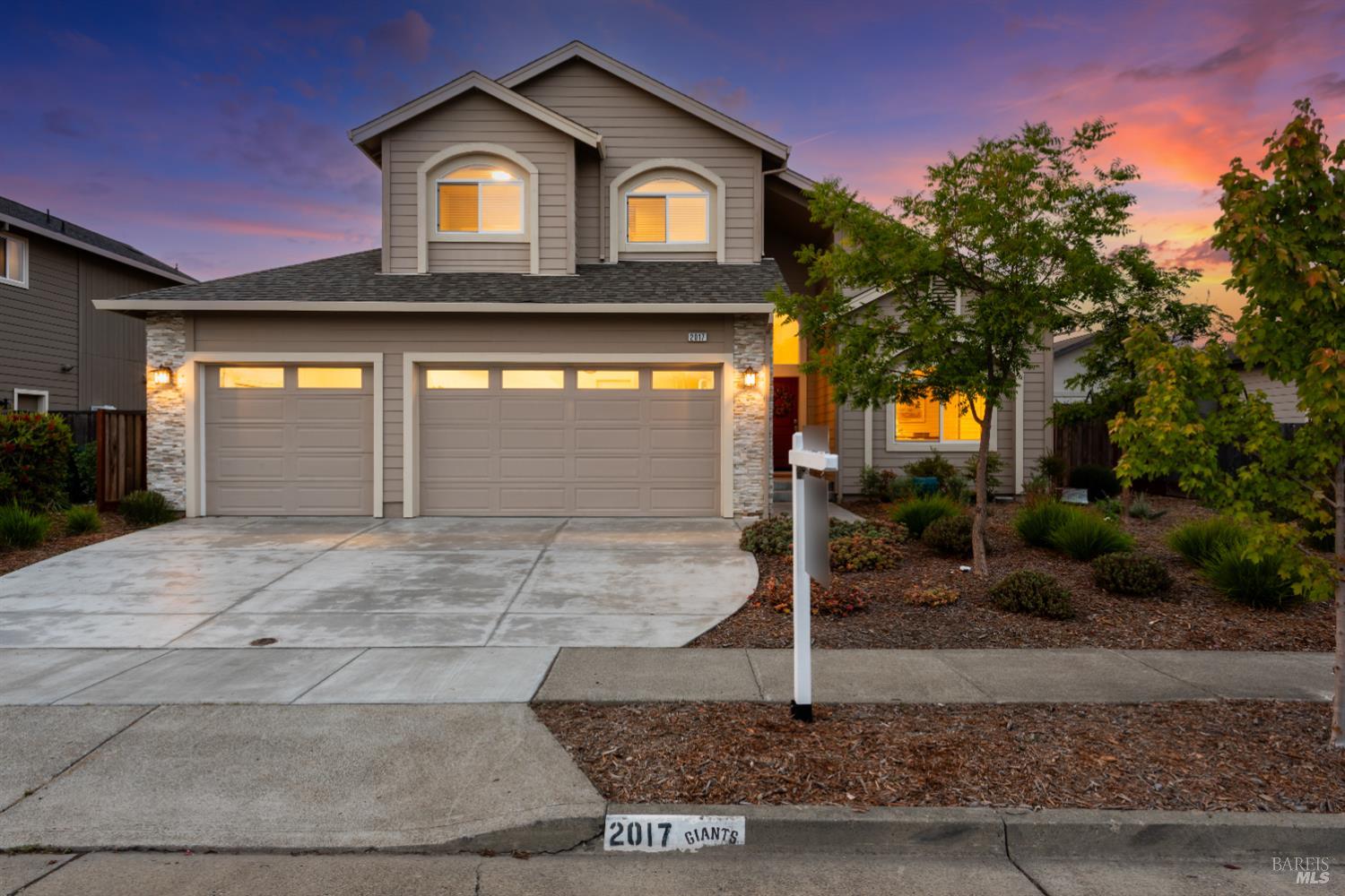 2017 Shelbourne Way Santa Rosa, CA 95403 - Photo 1 of 1 a front view of a house with garden
