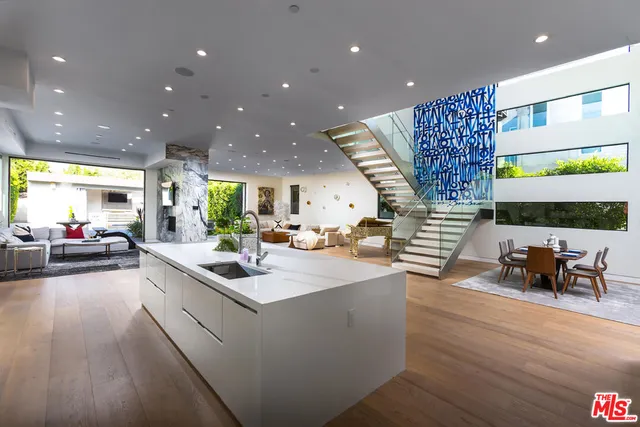 a room with gym equipment and appliances