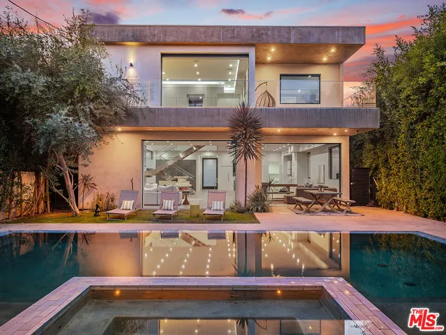 a view of a building with a yard