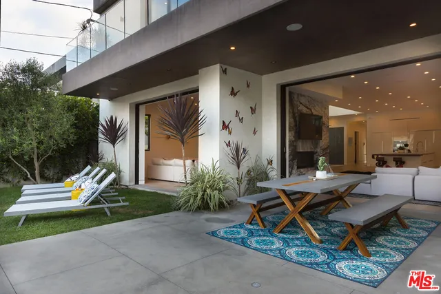 a view of swimming pool and lounge chair
