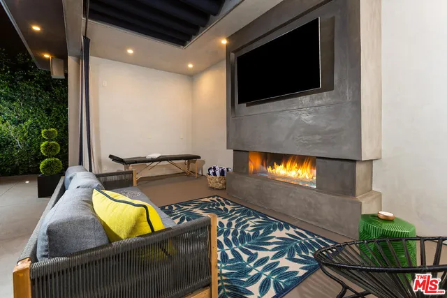 a room with furniture and a fireplace