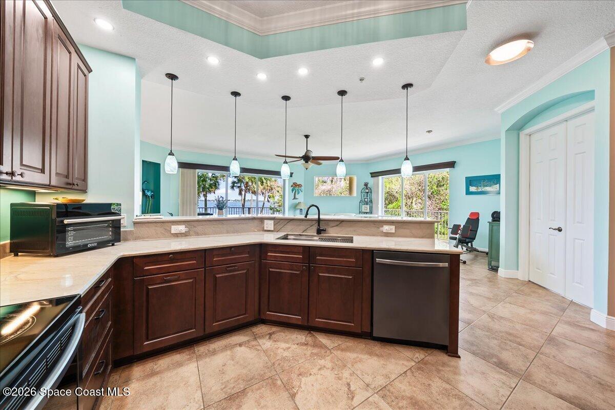 6005 Highway 1, Unit 101 Rockledge, FL 32955 - Photo 10 of 57 a large kitchen with lots of counter space sink and cabinets