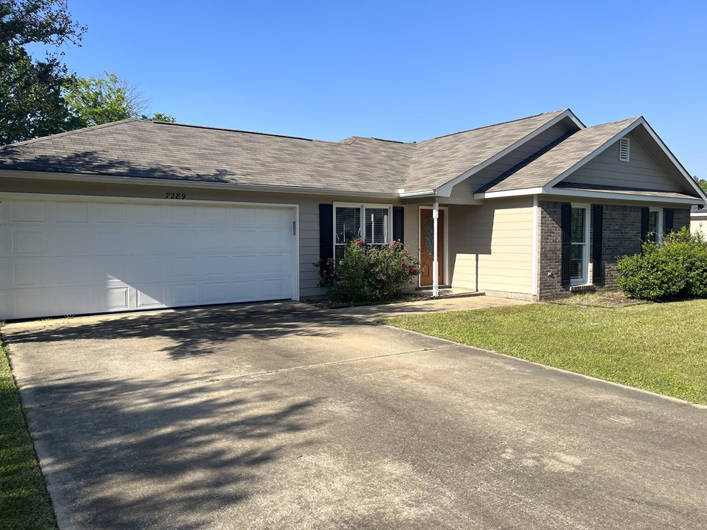 7289 Midland Chase Loop Columbus, GA 31909 - Photo 2 of 19 a view of a house with a yard