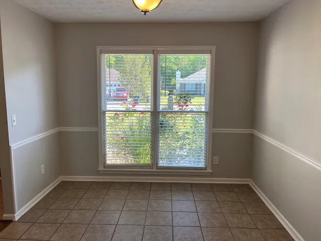 an empty room with a window