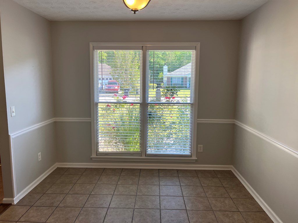 7289 Midland Chase Loop Columbus, GA 31909 - Photo 6 of 19 an empty room with a window