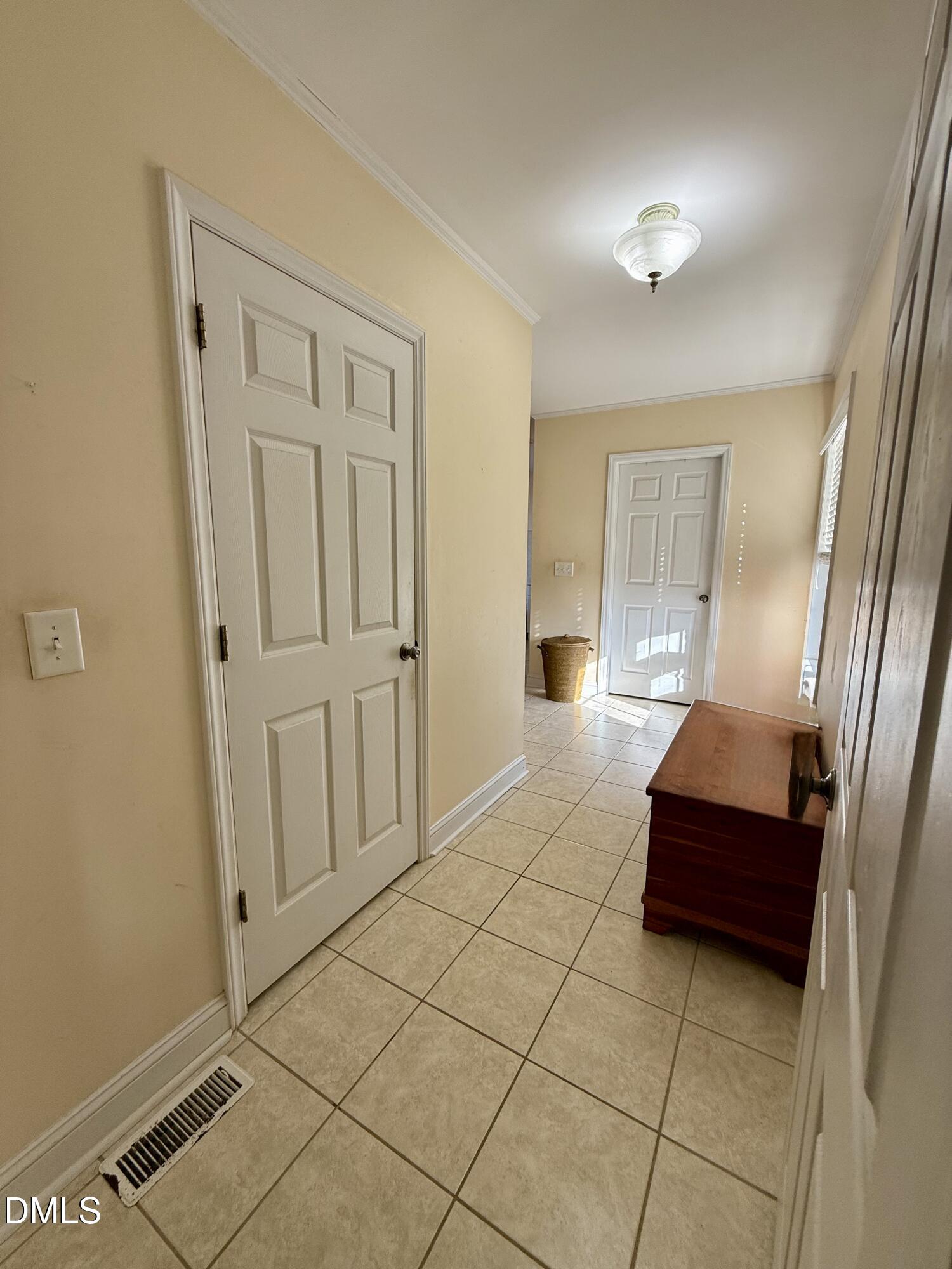 1689 Amelia Church Road Clayton, NC 27520 - Photo 18 of 23 a bedroom with a sink and a mirror