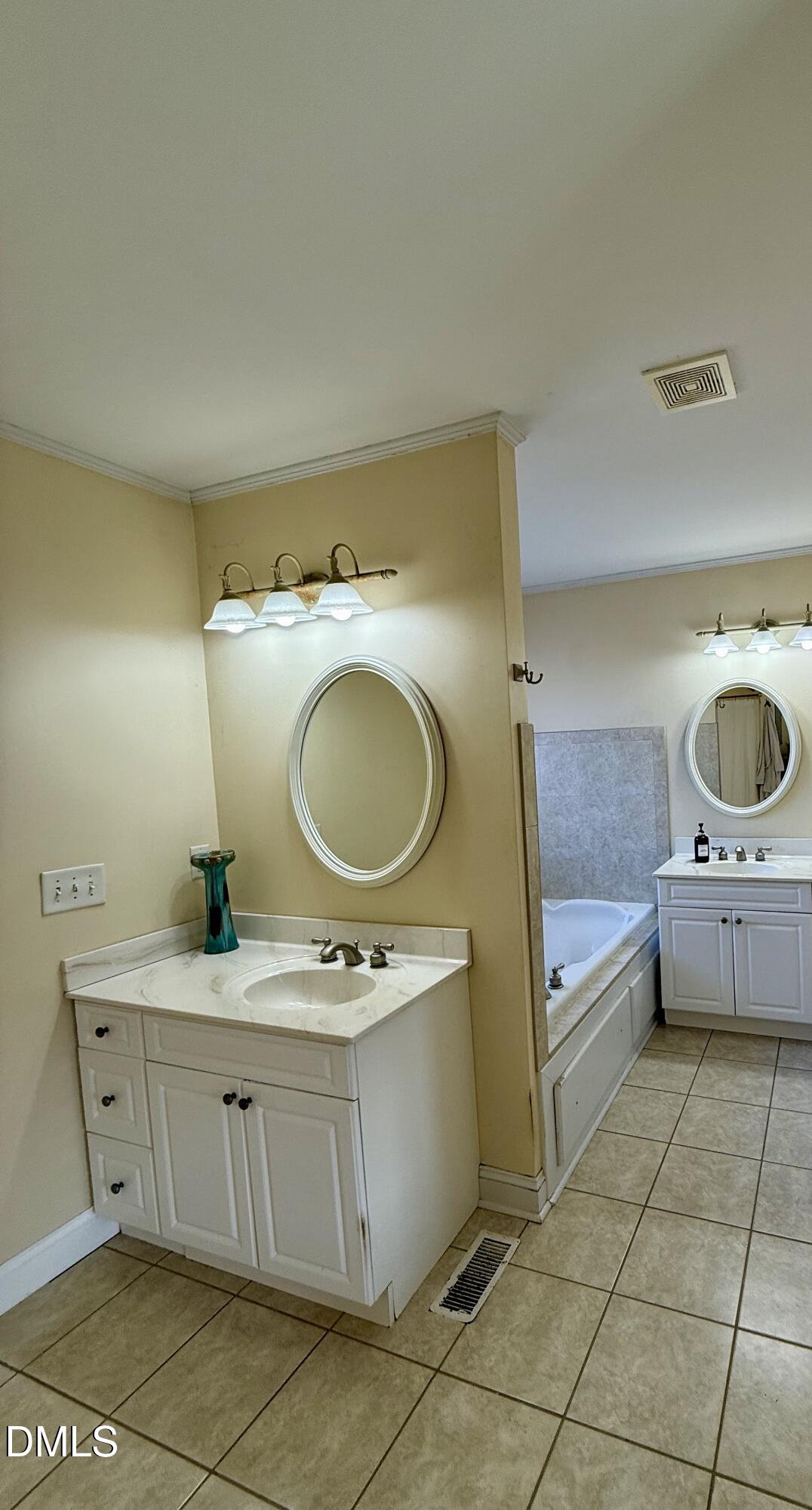 1689 Amelia Church Road Clayton, NC 27520 - Photo 20 of 23 a room with a stove top oven and a sink