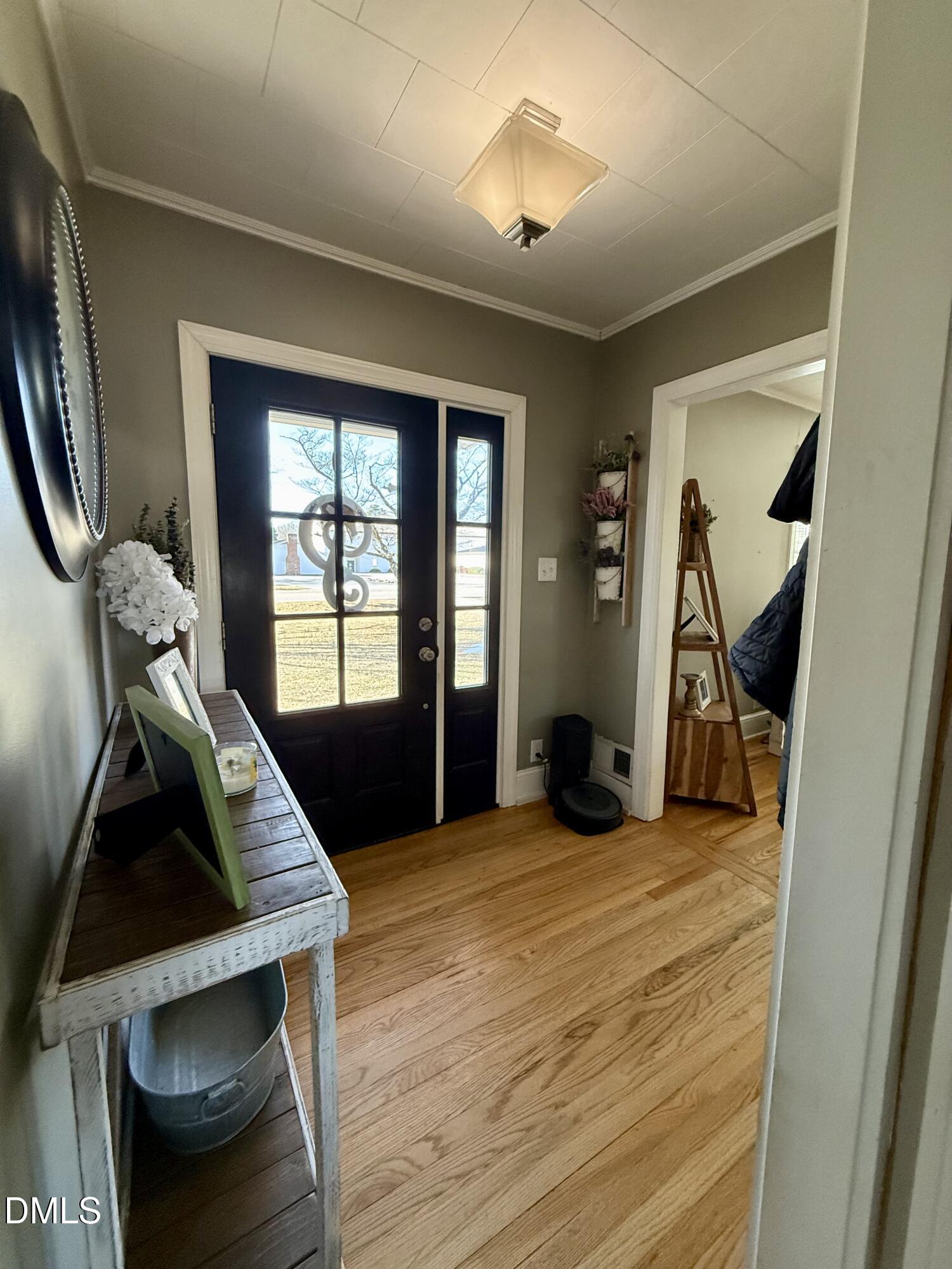 1689 Amelia Church Road Clayton, NC 27520 - Photo 4 of 23 a room with furniture and a window