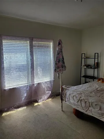 a kitchen with stainless steel appliances granite countertop a stove and a refrigerator