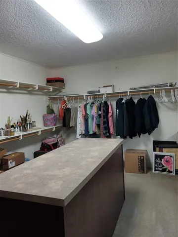 a kitchen with lots of storage and utility