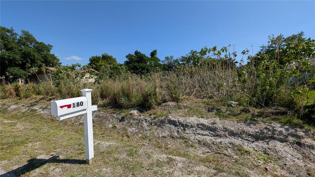177 Columbia Road Venice, FL 34293 - Photo 1 of 3 a sign that is on the side of a road