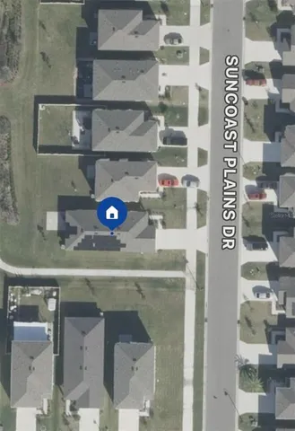 a kitchen with a sink and a mirror