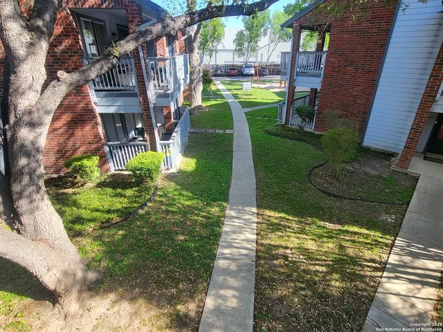 a view of an outdoor space deck and backyard