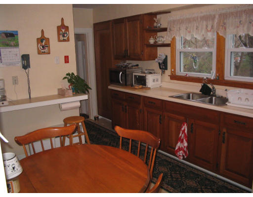 815 Boston Road Billerica, MA 01821 - Photo 6 of 7 a kitchen with a sink cabinets and window
