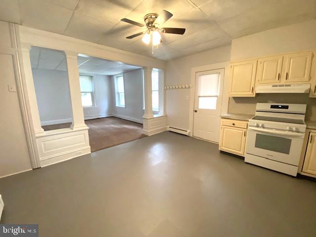 131 South 5th Street, Unit B Perkasie, PA 18944 - Photo 2 of 9 a view of a kitchen with a stove cabinets and a kitchen