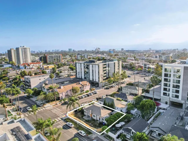 an aerial view of a city with lots of residential buildings
