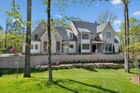 a view of a house with a swimming pool