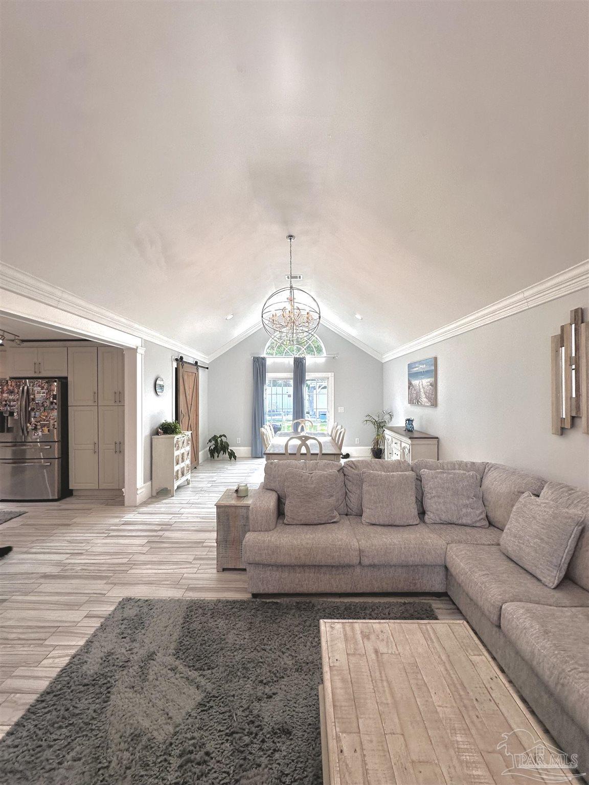 3097 Fayal Drive Pensacola, FL 32526 - Photo 14 of 46 a living room with furniture and a large window