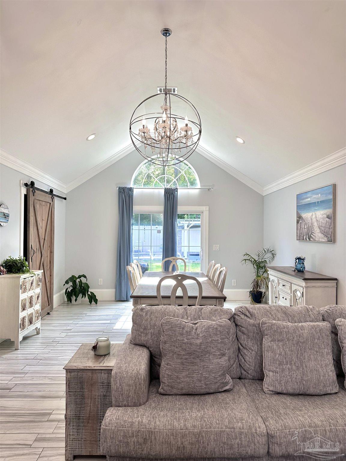 3097 Fayal Drive Pensacola, FL 32526 - Photo 15 of 46 a living room with furniture chandelier and a chandelier