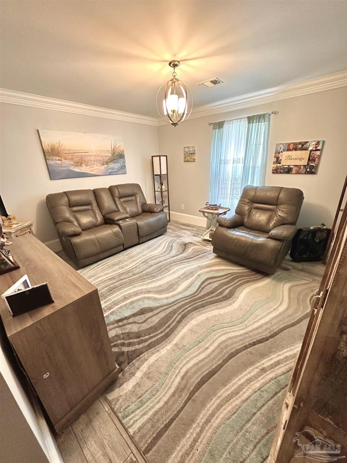 3097 Fayal Drive Pensacola, FL 32526 - Photo 32 of 46 a bedroom with a bed and window