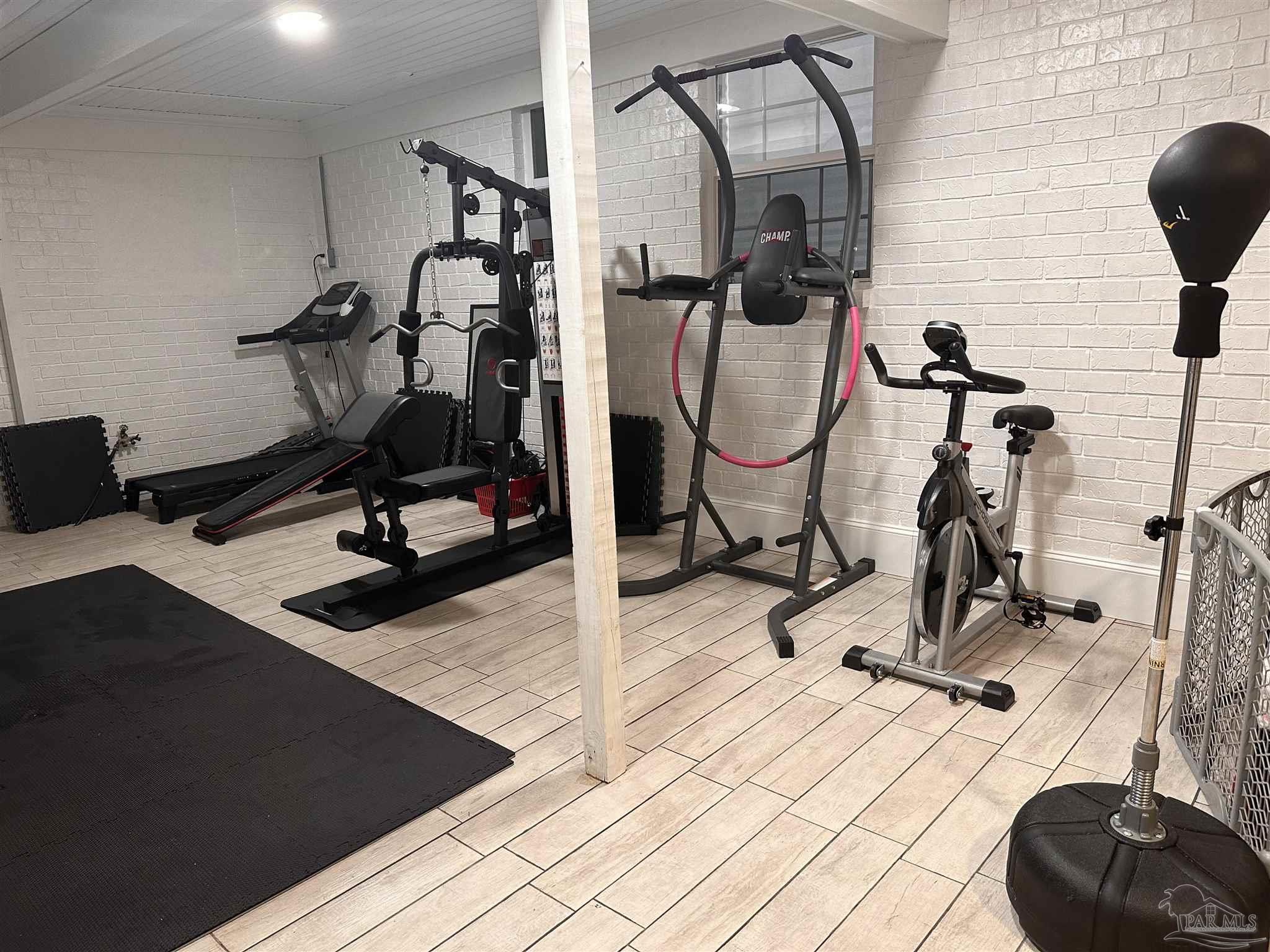 3097 Fayal Drive Pensacola, FL 32526 - Photo 35 of 46 a view of a room with gym equipment