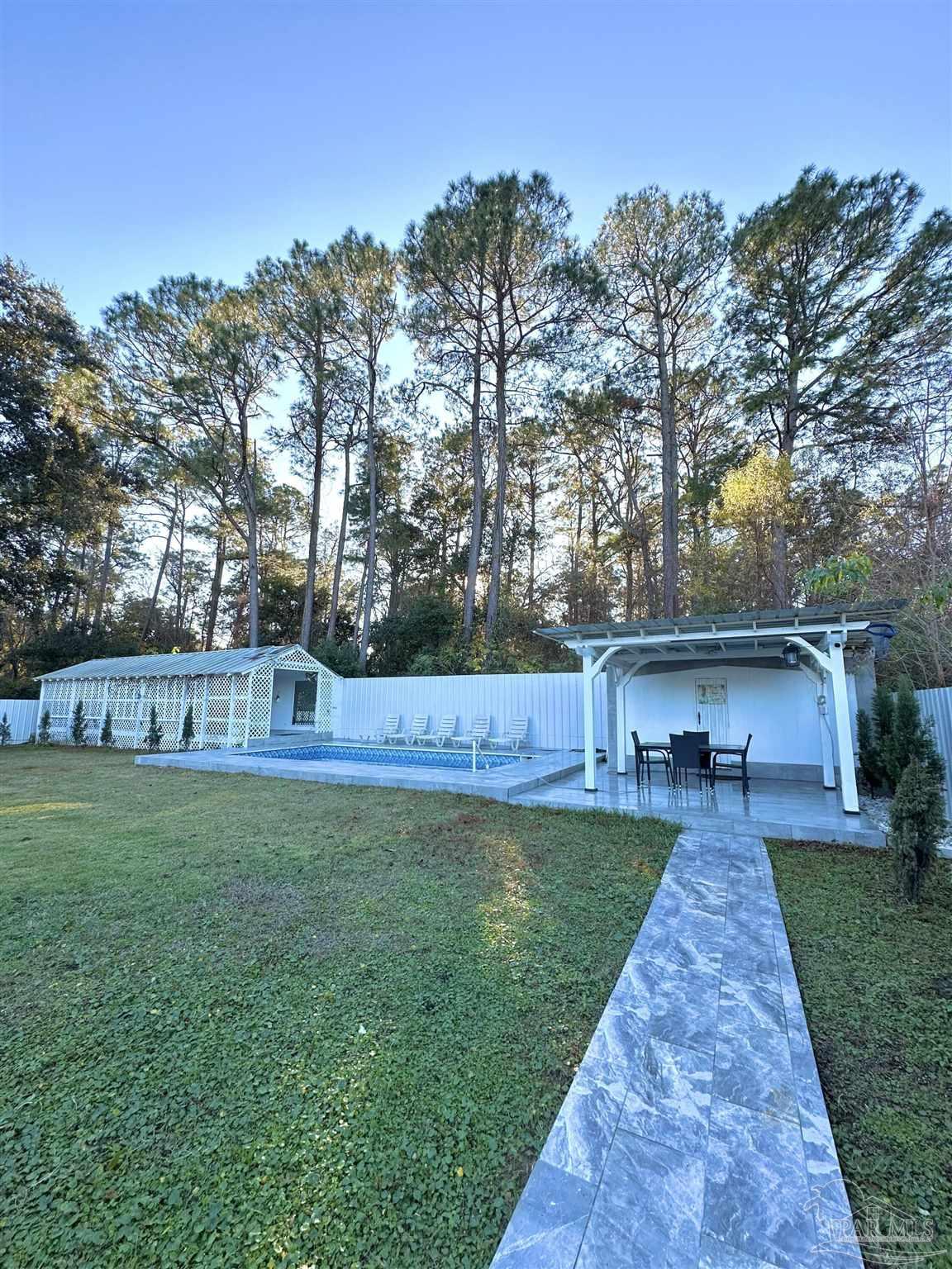 3097 Fayal Drive Pensacola, FL 32526 - Photo 39 of 46 front view of a house with a yard