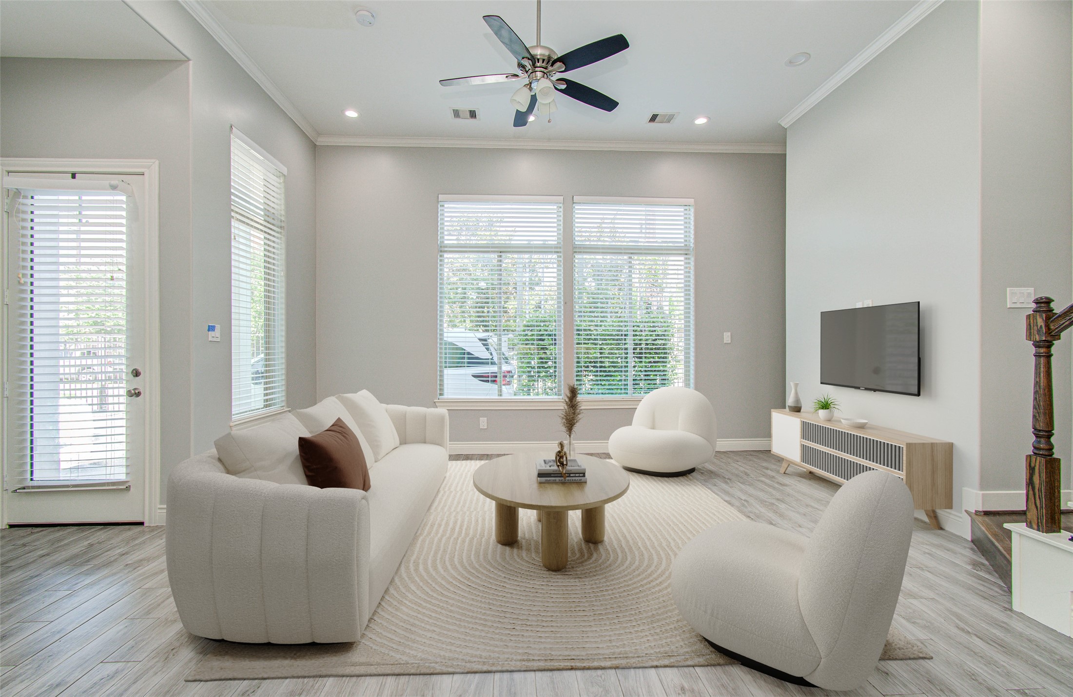 8903 Spring Knoll Forest Drive Houston, TX 77080 - Photo 4 of 29 a living room with furniture and a flat screen tv