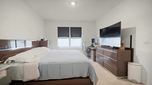 a bathroom with a double vanity sink and mirror