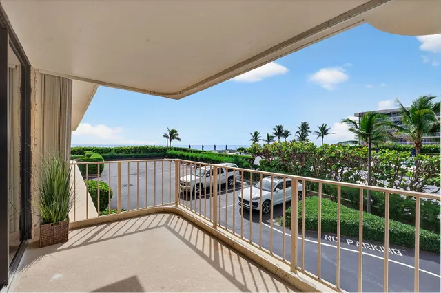 a view of balcony with furniture