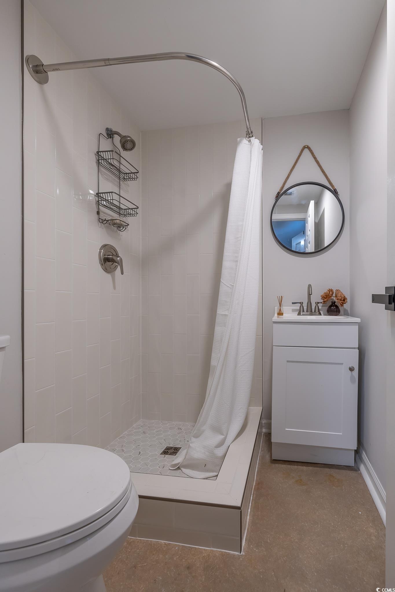 5137 Highway 17 Business, Unit 3A Murrells Inlet, SC 29576 - Photo 13 of 31 Bathroom featuring a stall shower and vanity