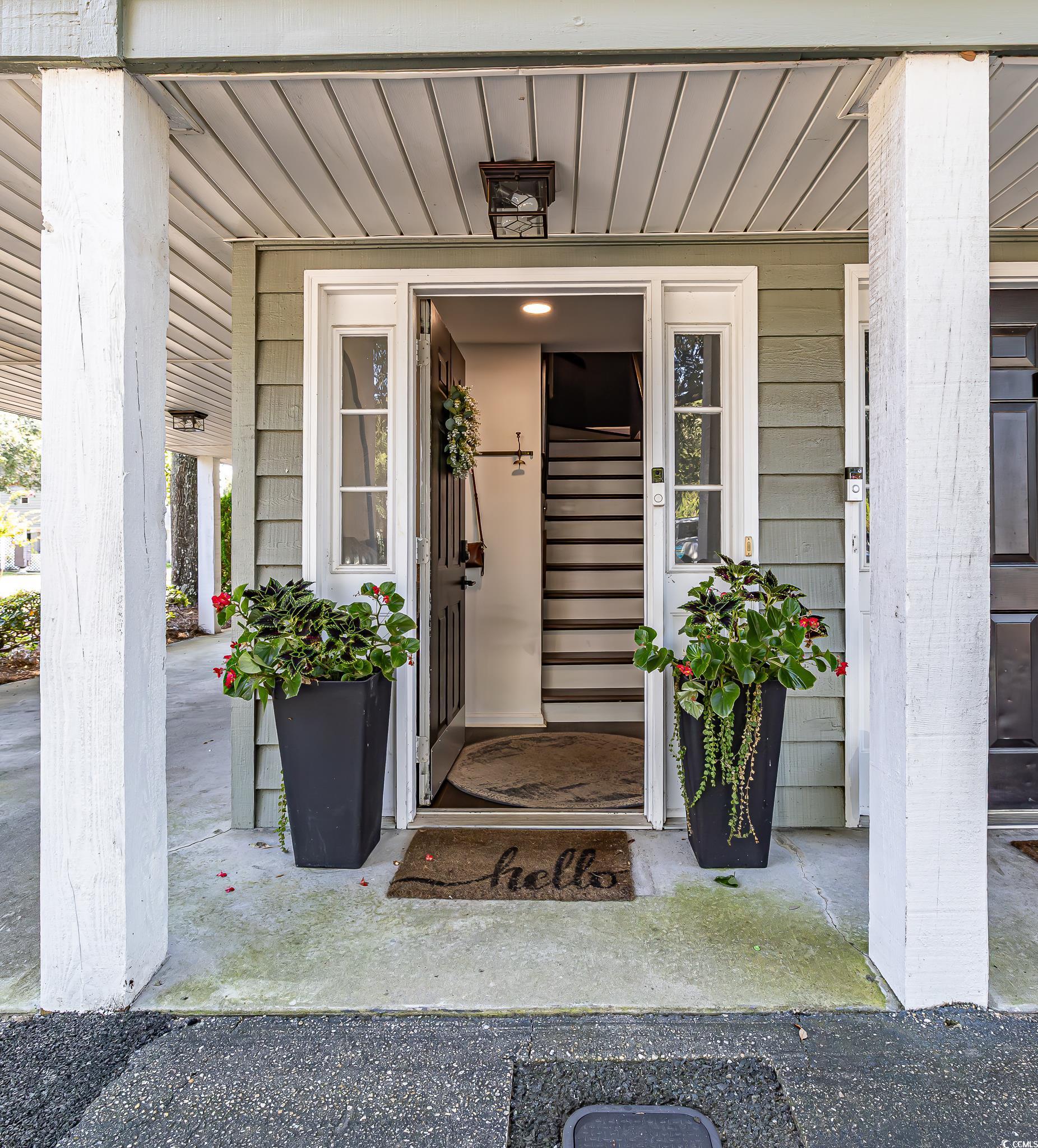5137 Highway 17 Business, Unit 3A Murrells Inlet, SC 29576 - Photo 16 of 31 View of exterior entry featuring a porch