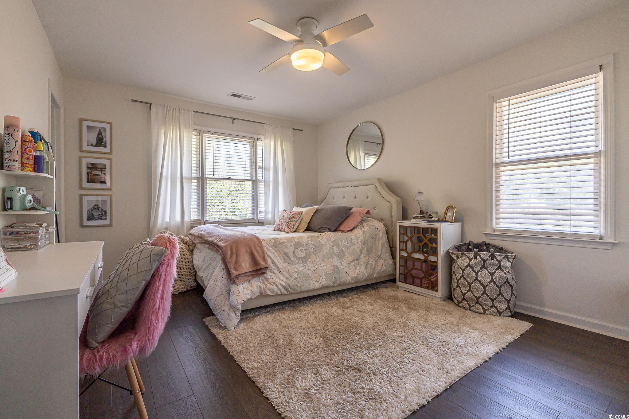 5137 Highway 17 Business, Unit 3A Murrells Inlet, SC 29576 - Photo 27 of 31 Bedroom featuring dark wood finished floors and ceiling fan