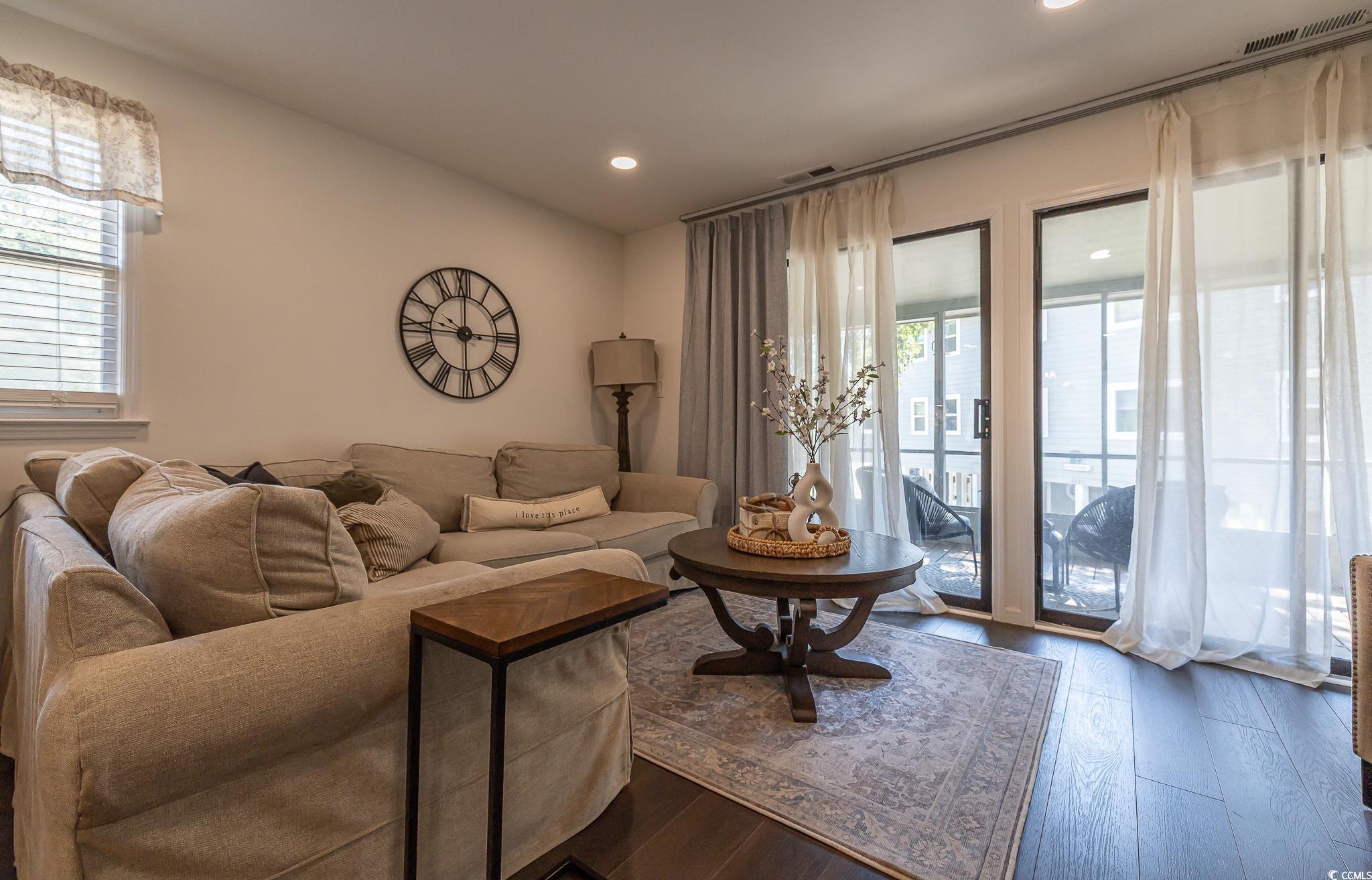5137 Highway 17 Business, Unit 3A Murrells Inlet, SC 29576 - Photo 29 of 31 Living area featuring plenty of natural light, dark wood-style floors, and recessed lighting