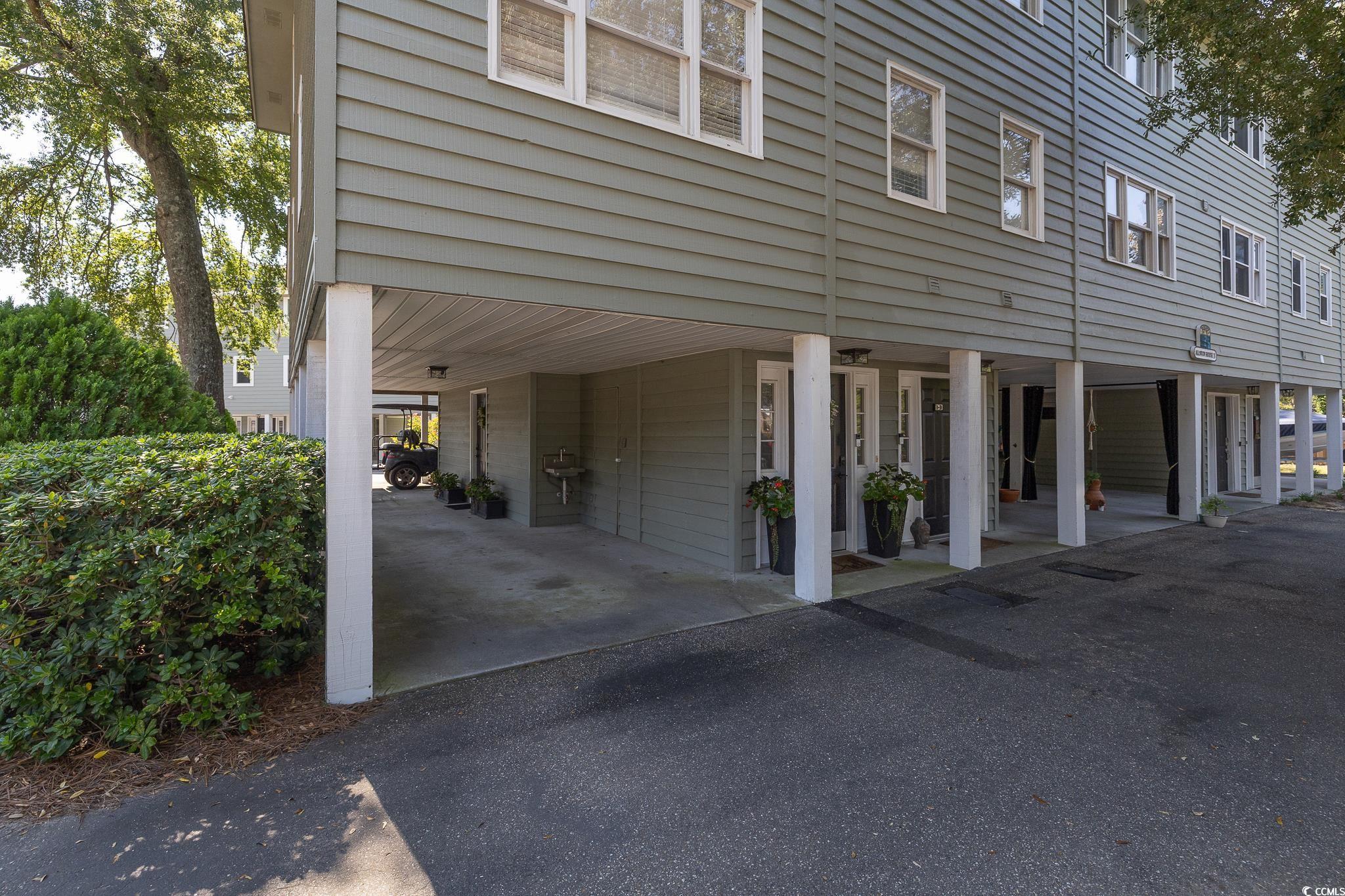 5137 Highway 17 Business, Unit 3A Murrells Inlet, SC 29576 - Photo 4 of 31 View of side of home