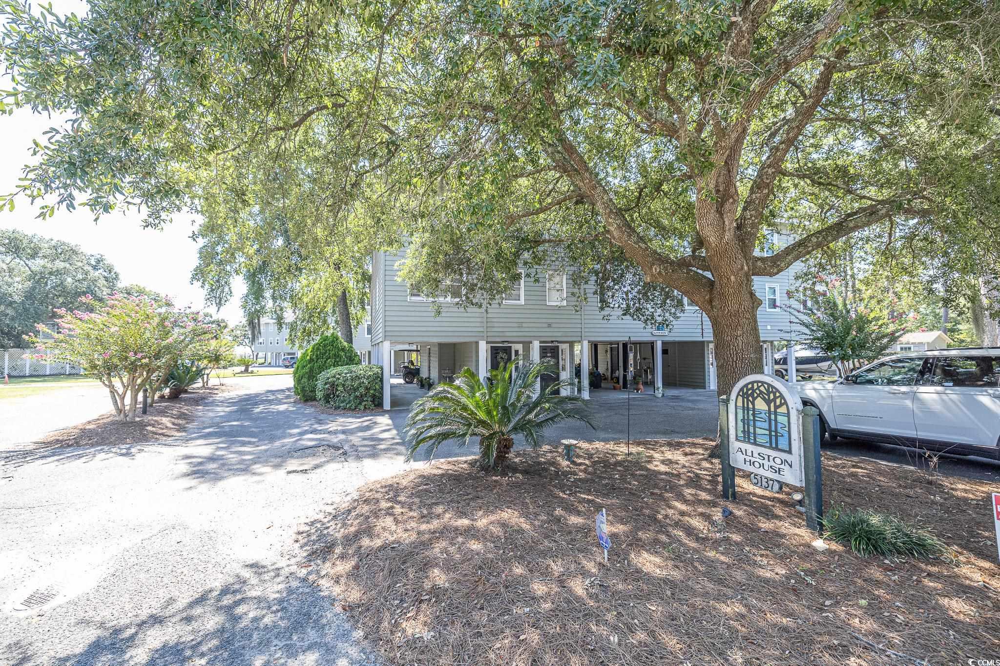 5137 Highway 17 Business, Unit 3A Murrells Inlet, SC 29576 - Photo 5 of 31 View of property hidden behind natural elements