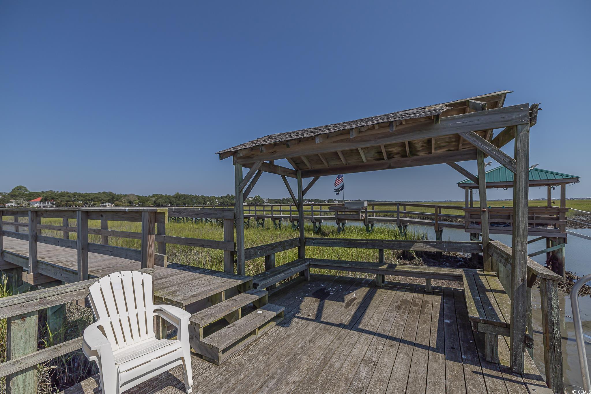 5137 Highway 17 Business, Unit 3A Murrells Inlet, SC 29576 - Photo 9 of 31 Wooden terrace featuring a water view