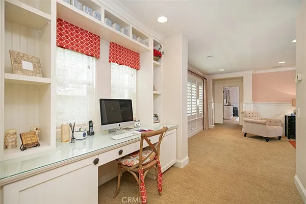 a living room with furniture and white walls