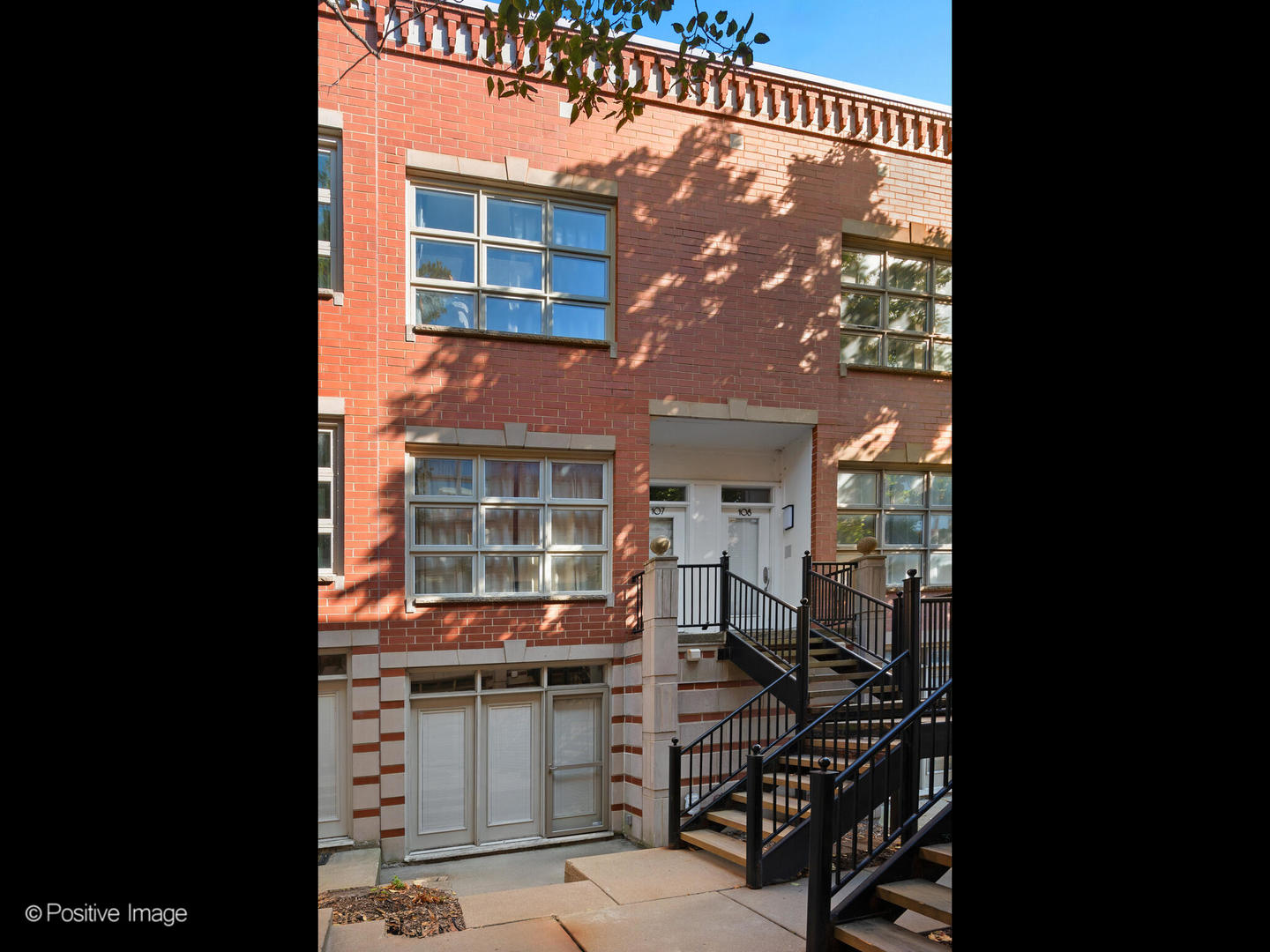 855 West Erie Street, Unit 107 Chicago, IL 60642 - Photo 1 of 21 a view of a house with backyard