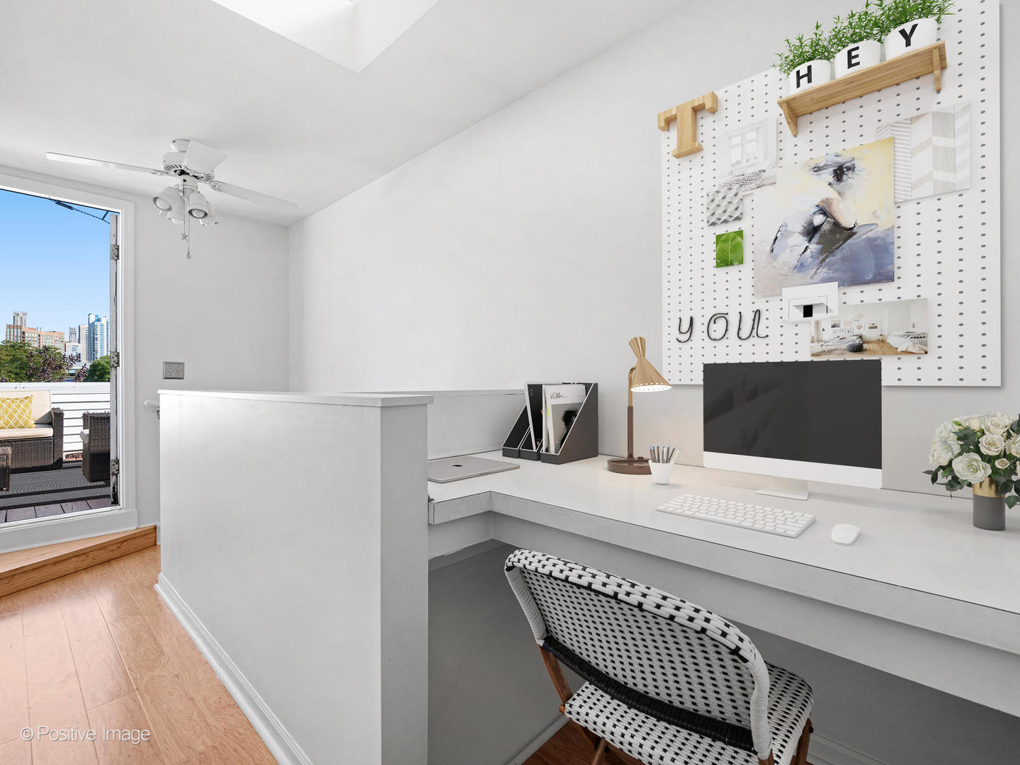 855 West Erie Street, Unit 107 Chicago, IL 60642 - Photo 13 of 21 a view of kitchen with furniture and wooden floor