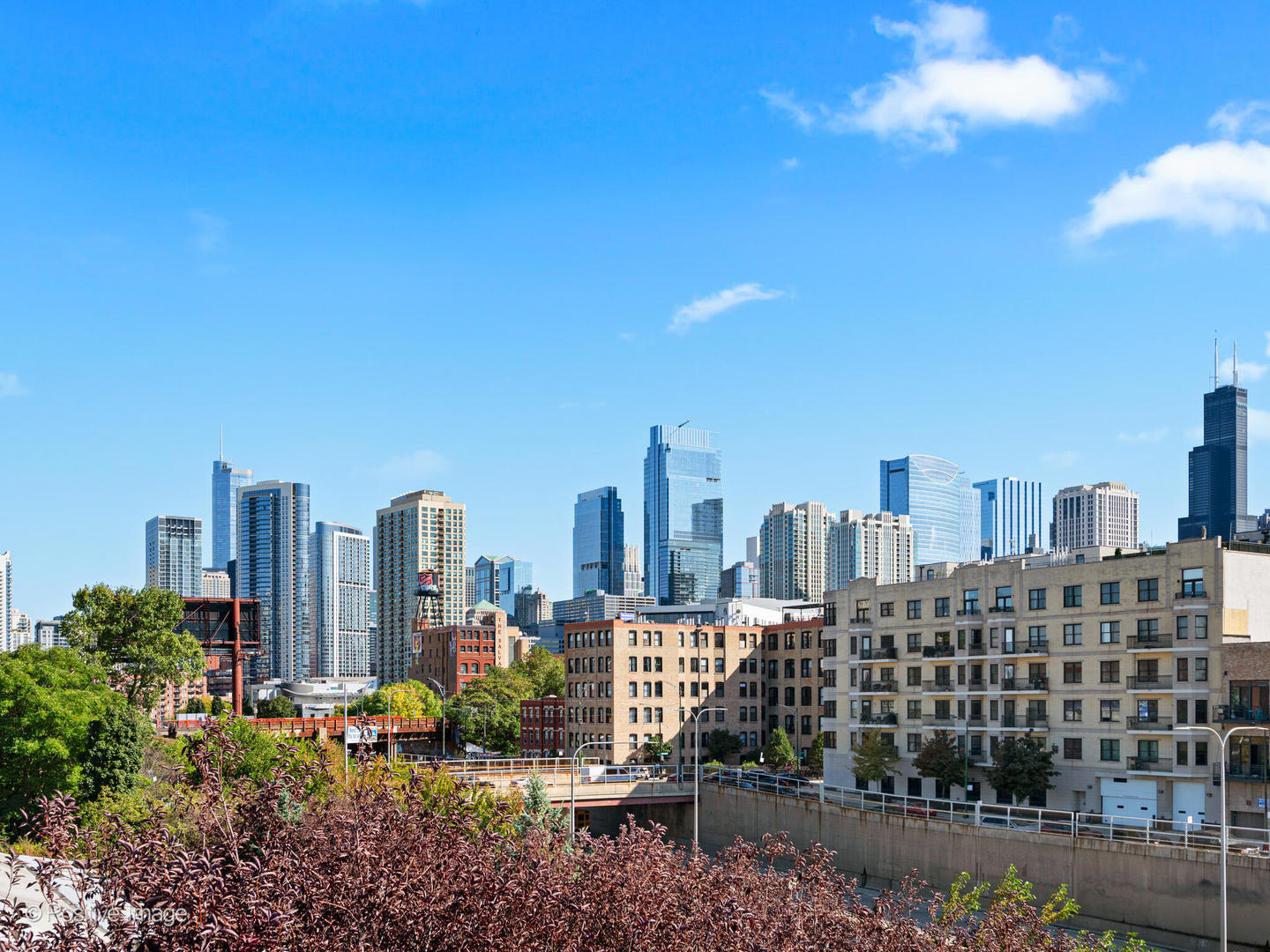855 West Erie Street, Unit 107 Chicago, IL 60642 - Photo 21 of 21 a view of a city with tall buildings