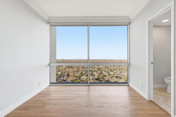 a bathroom with a sink a mirror and a toilet