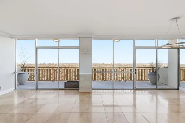 a view of a room with windows