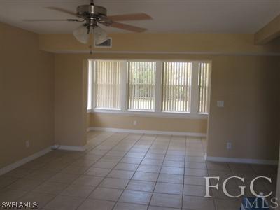 2120 Earl Road Fort Myers, FL 33901 - Photo 5 of 10 a view of an empty room with a window